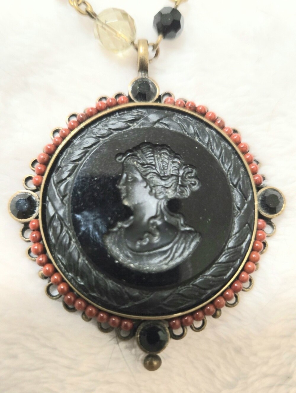 Vintage EXTASIA hand pressed Bavarian glass cameo pendant.